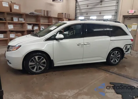2015 Honda Odyssey Touring/Touring Elite z USA, uszkodzony, nr VIN 5FNRL5H96FB044657